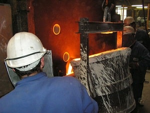 Molten metal during the manufacture of a sand casting runner